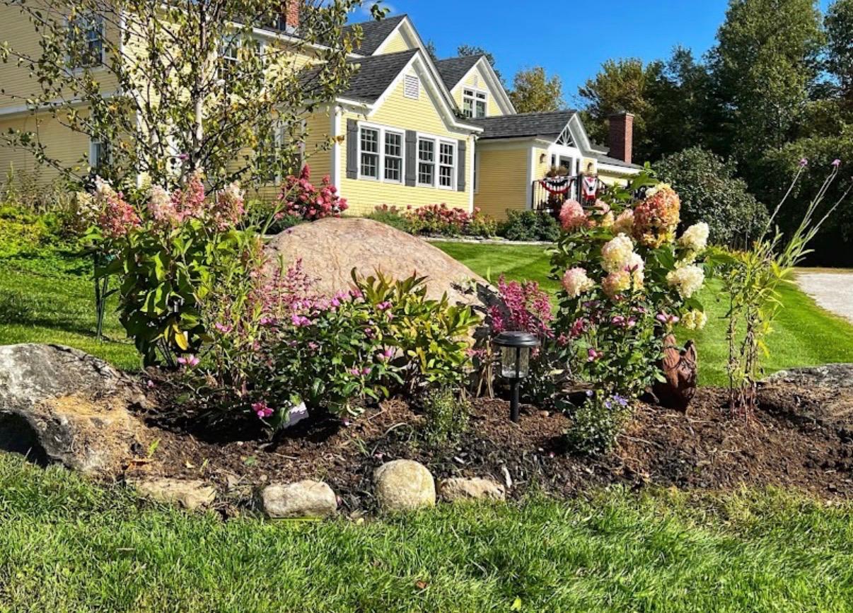 Main House Exterior — fall garden and facade